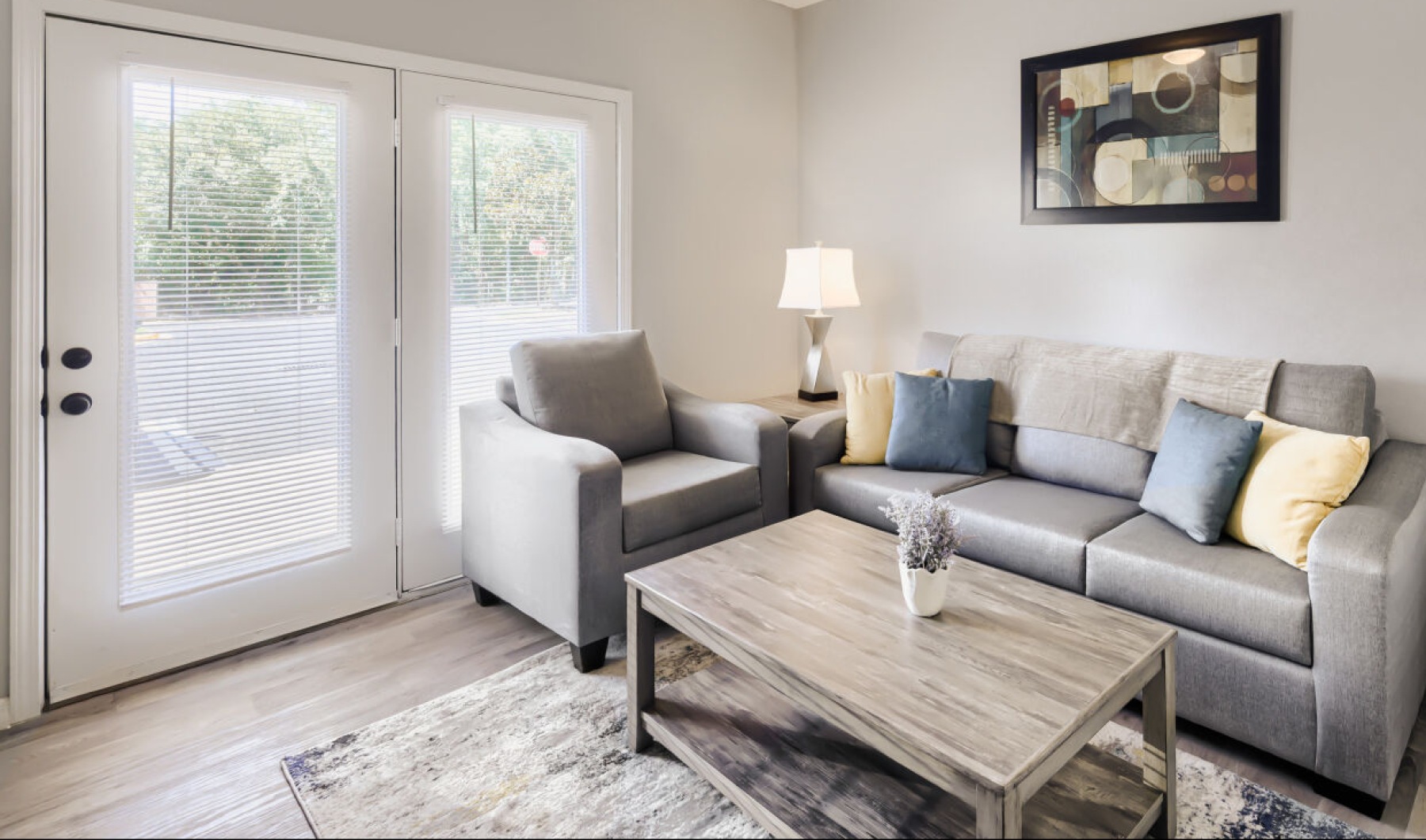 Open space living area with natural lighting