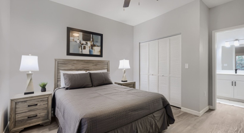 Bedroom with natural lighting and high ceilings