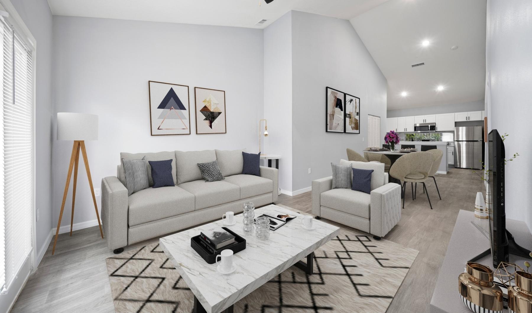 a living room with a couch and a table