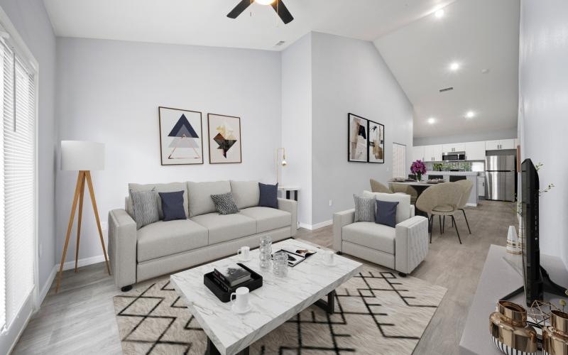 a living room with a couch and a table